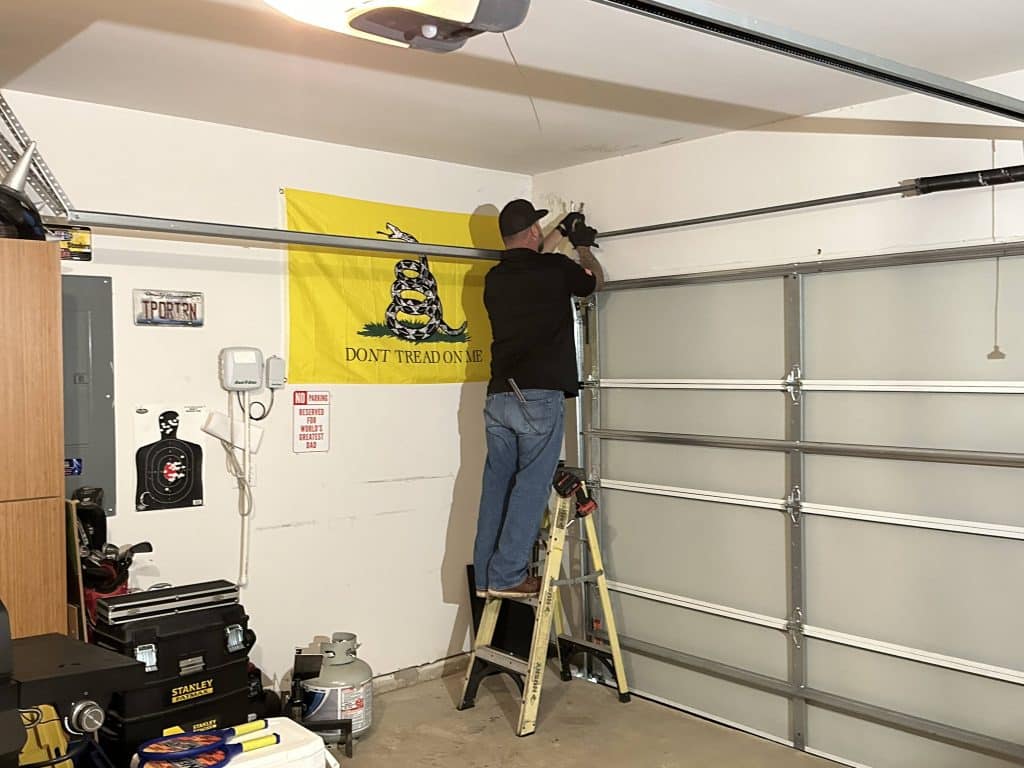 expert working on a garage door
